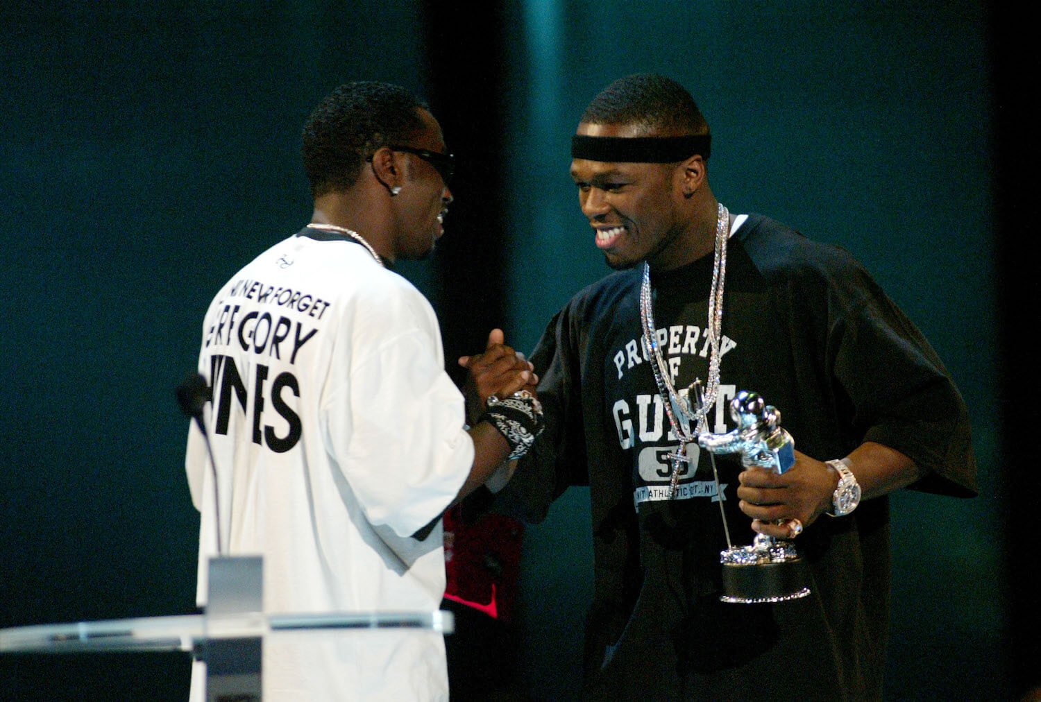 Sean 'P. Diddy' Combs giving an award to 50 Cent
