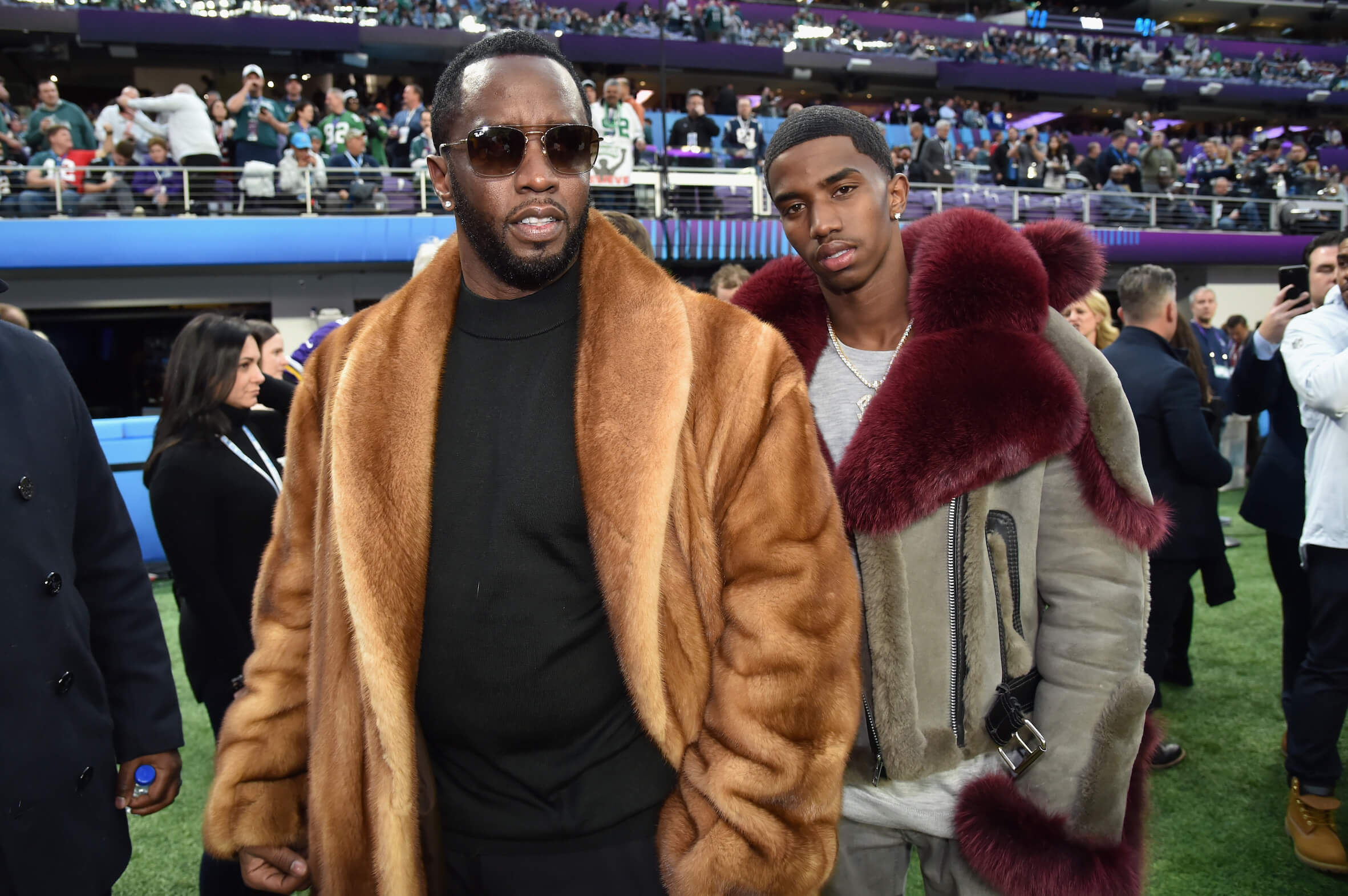 Sean 'P. Diddy' Combs standing next to his son, Christian 'King' Combs, at the Super Bowl in 2018
