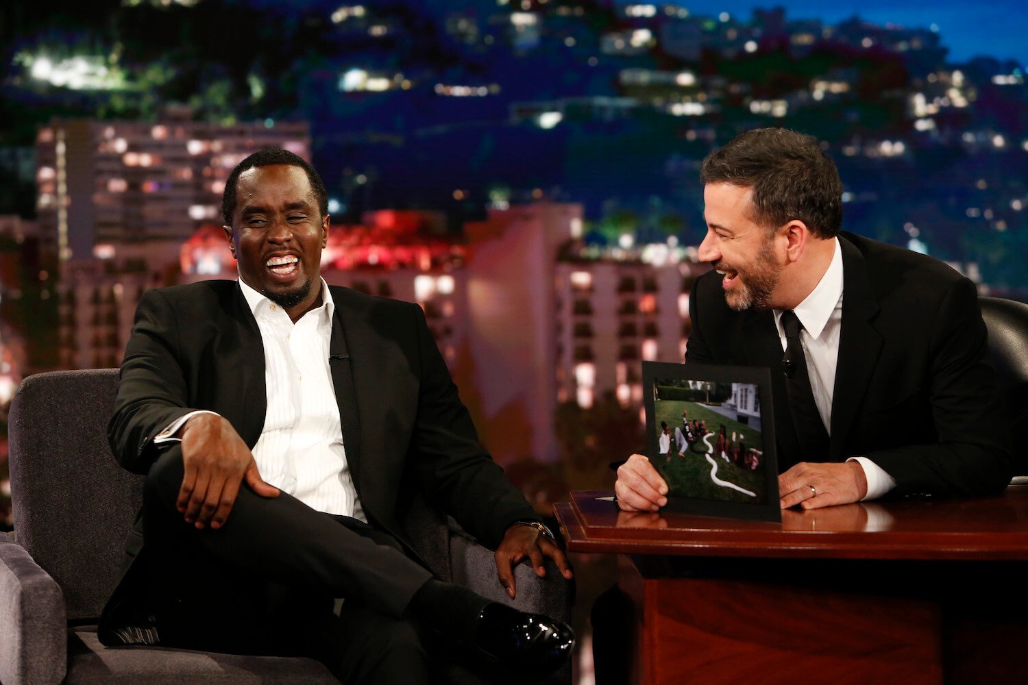 Sean 'P. Diddy' Combs laughing next to Jimmy Kimmel on 'Jimmy Kimmel Live!'