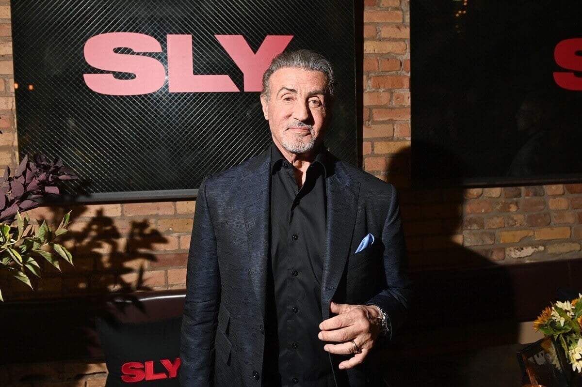 Sylvester Stallone attends Netflix's "Sly" world premiere in a black suit.
