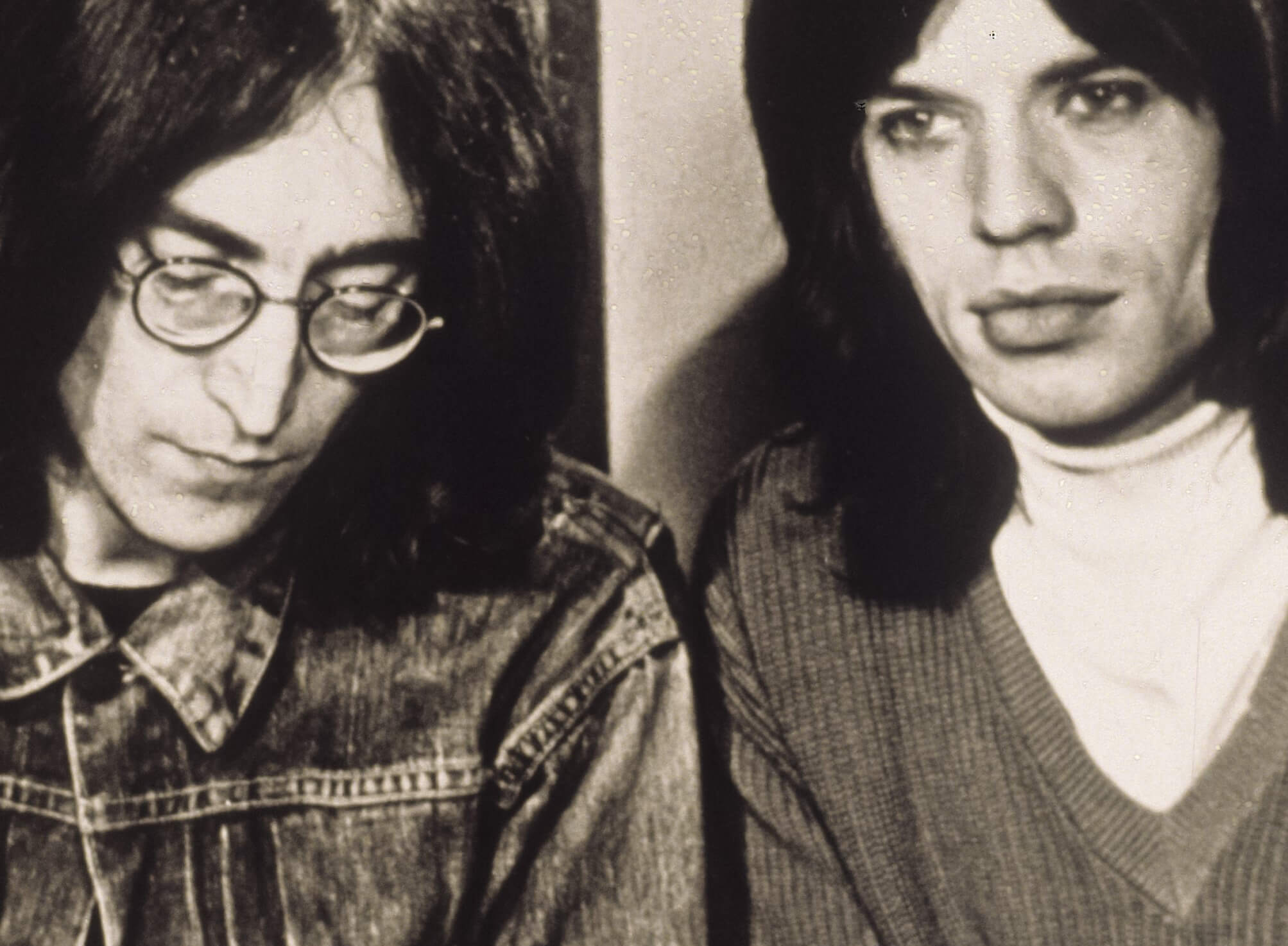 The Beatles' John Lennon and The Rolling Stones' Mick Jagger in black-and-white