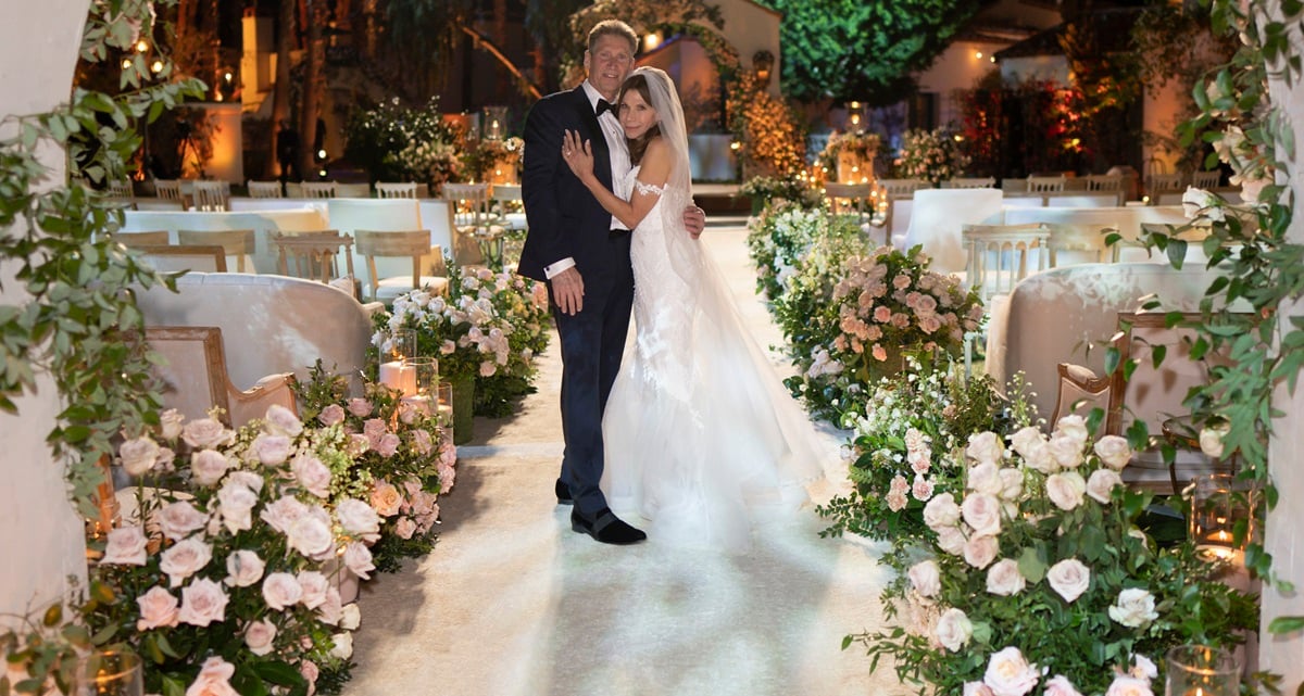 Gerry Turner and Theresa Nist pose together during their televized wedding. Their 'The Golden Bachelor' romance is ending in divorce.