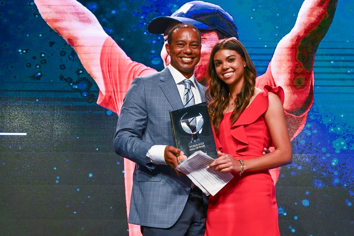Tiger Woods and his daughter Sam, pose on stage during the World Golf Hall of Fame Induction Ceremony