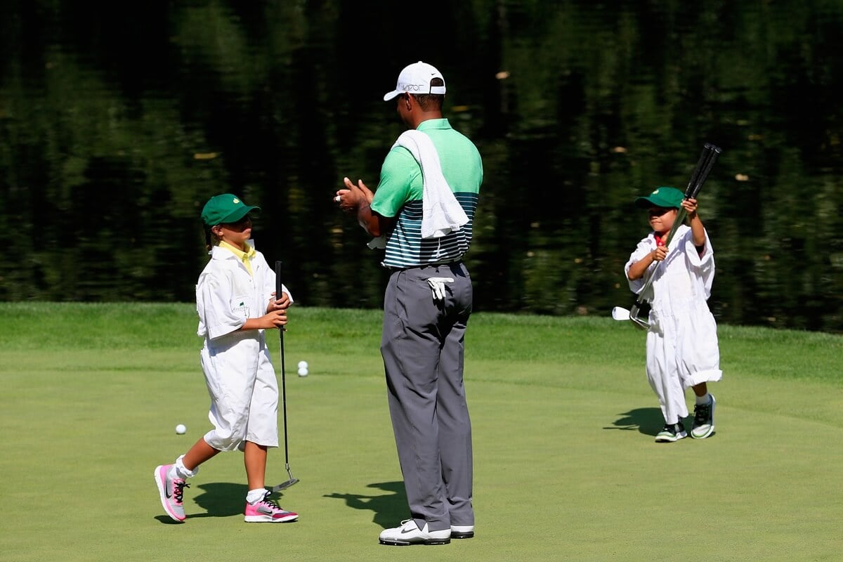 Tiger Woods with his son, Charlie, and daughter, Sam, during the Par 3 Contest prior to the start of the 2015 Masters Tournament