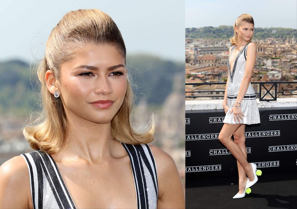 'Challengers' star Zendaya stands and smiles in a white tennis tank top and skirt on a rooftop in Rome, Italy