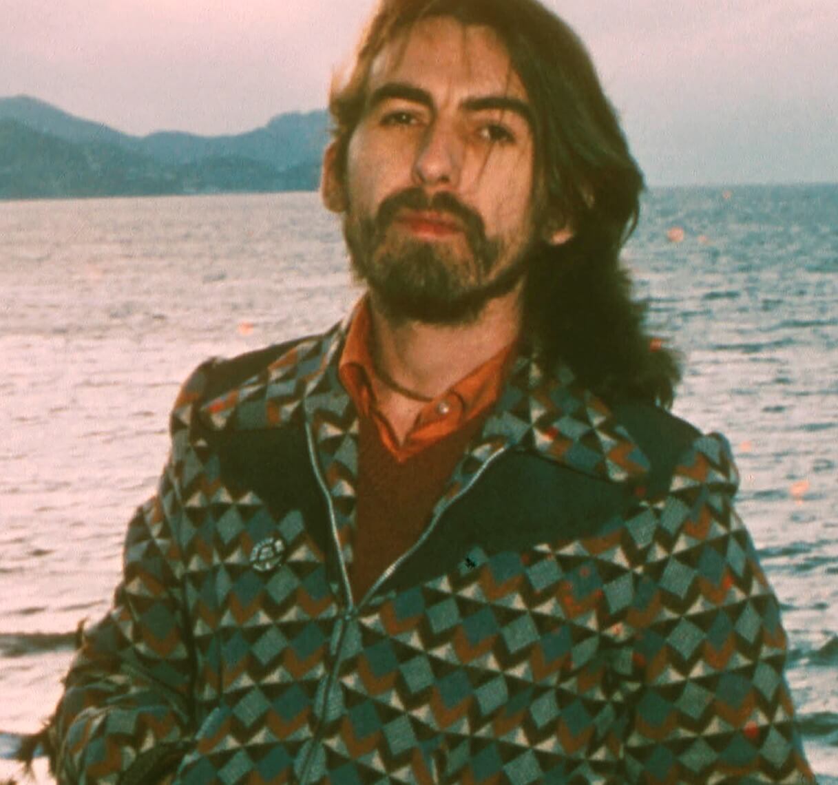 George Harrison near the water