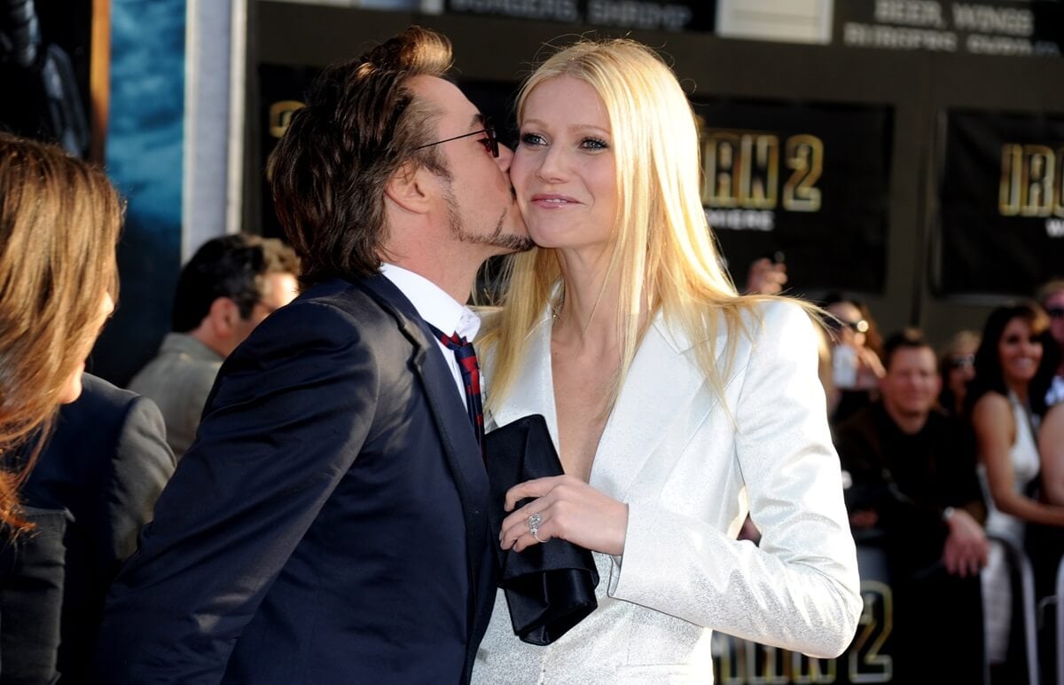 Robert Downey Jr. and Gwyneth Paltrow posing at the premiere of 'Iron Man 2'.