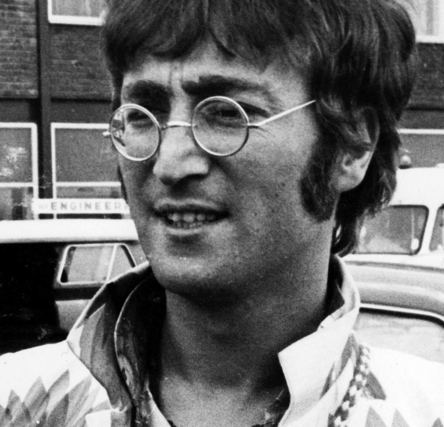 John Lennon wearing glasses