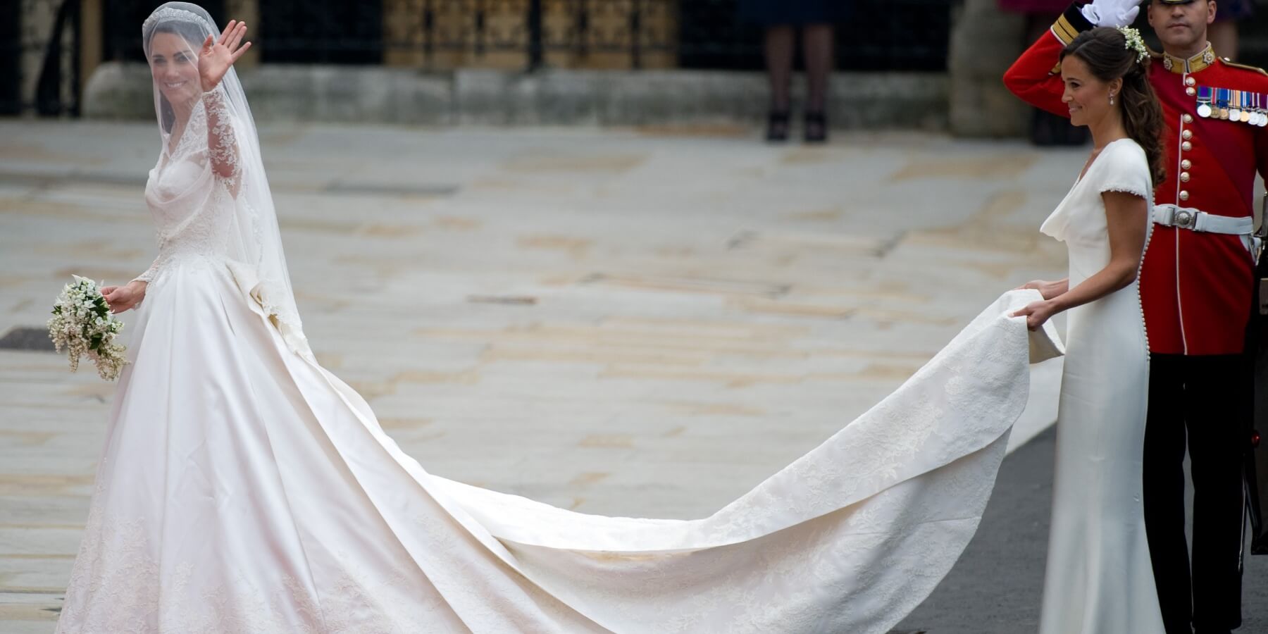 Kate Middleton and Pippa Middleton photographed at the royal wedding of 2011 where Pippa's dress caused a commotion.