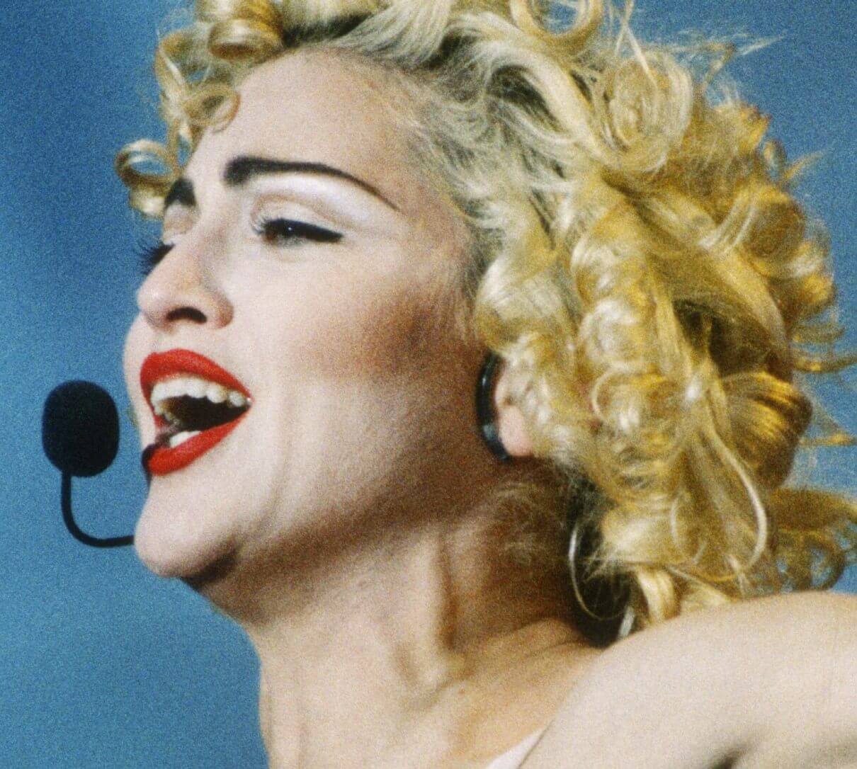 "Lucky Star" singer Madonna with a microphone