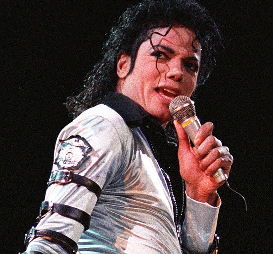 "Bad" singer Michael Jackson with a microphone