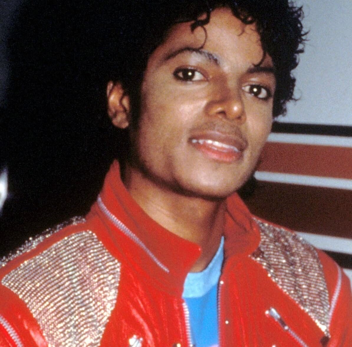 "Man in the Mirror" singer Michael Jackson wearing orange
