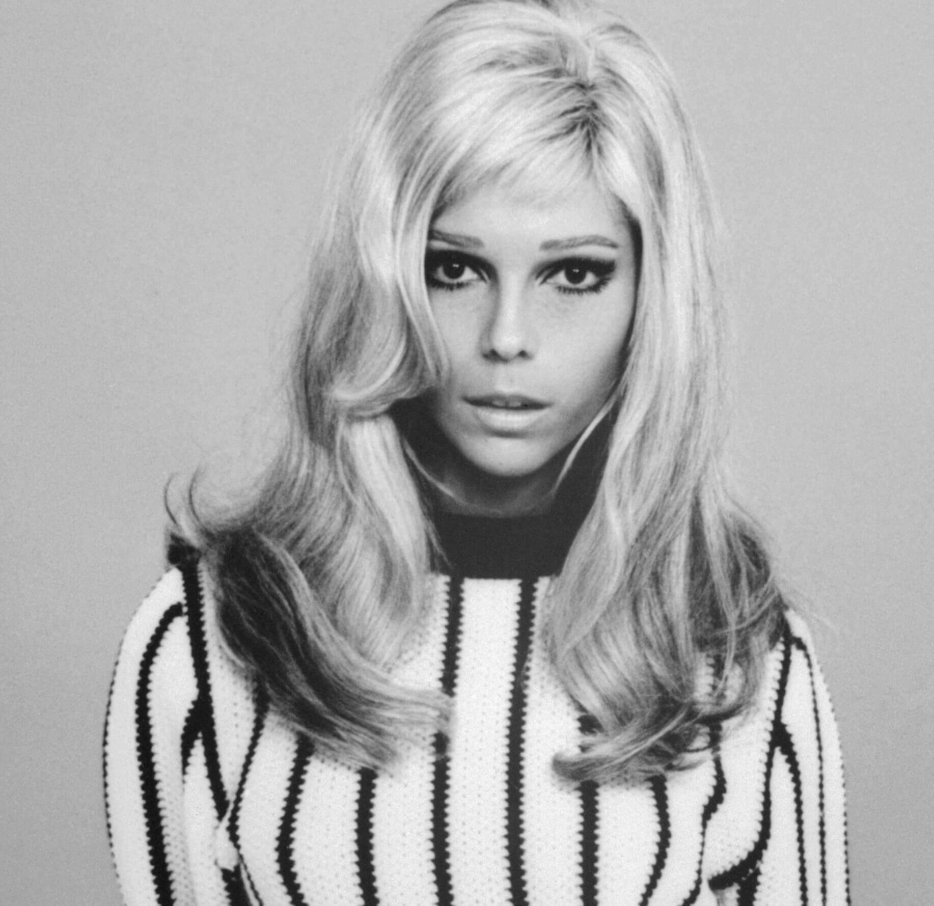 "These Boots Are Made for Walkin'" singer Nancy Sinatra in black-and-white