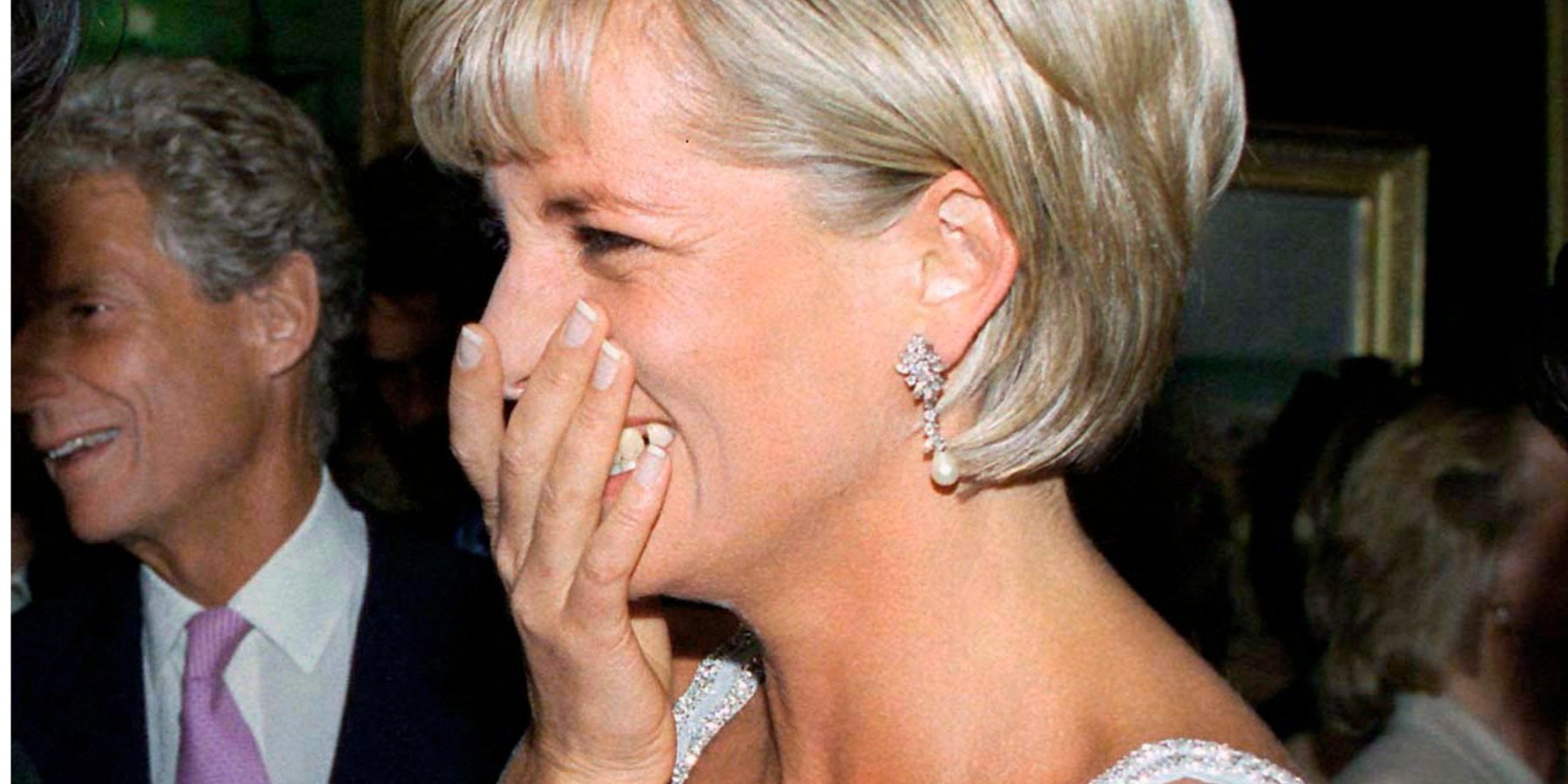 Princess Diana laughing in a photo snapped in the 1990s.