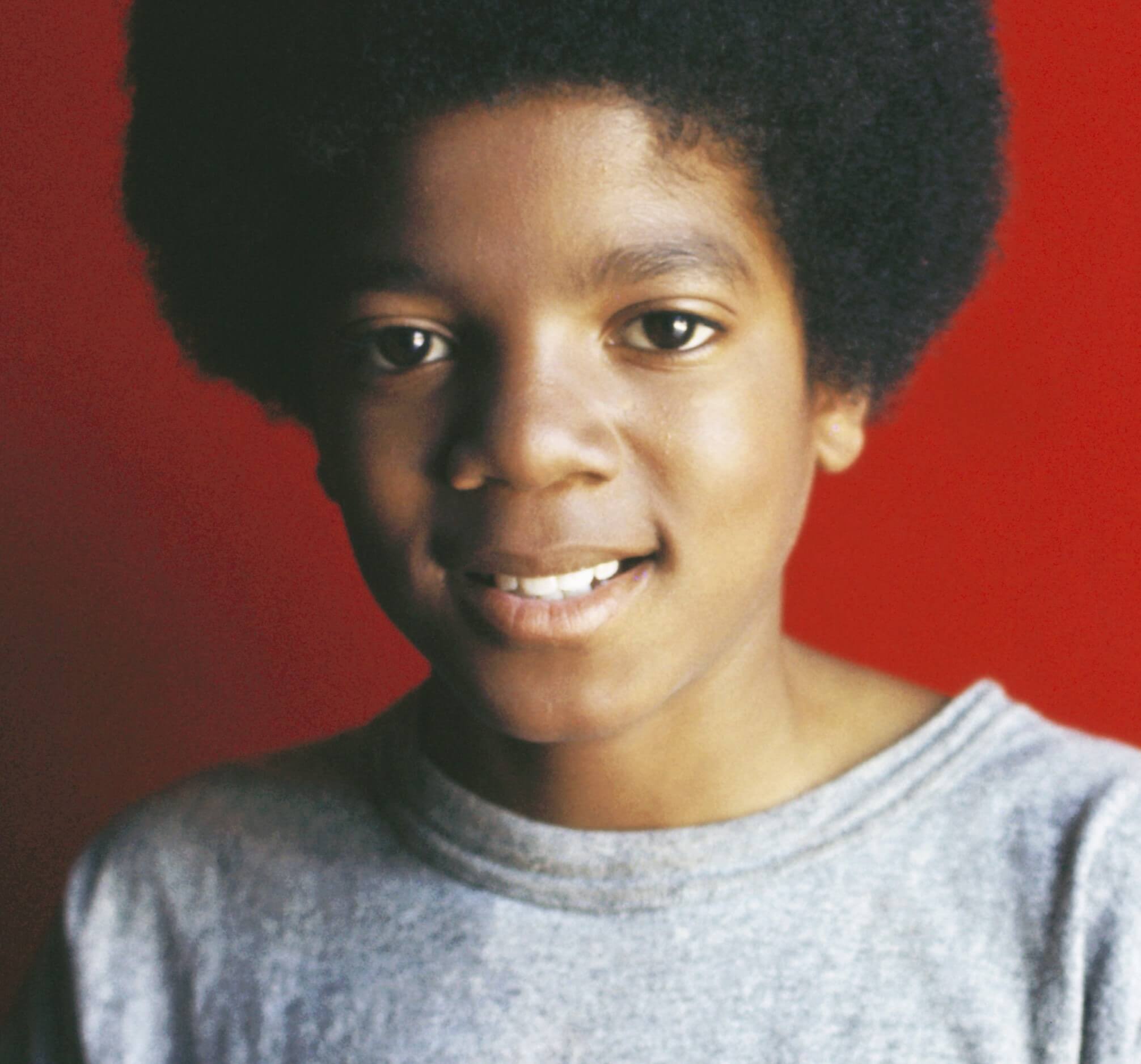 Michael Jackson of The Jackson 5 with a red background