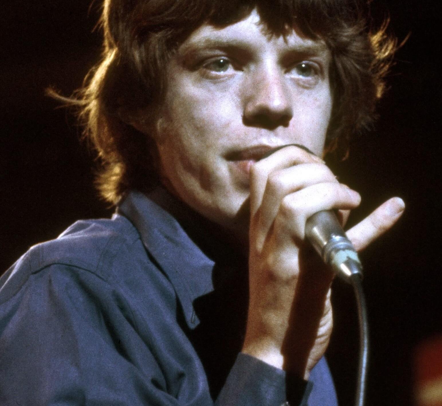 The Rolling Stones' Mick Jagger wearing blue