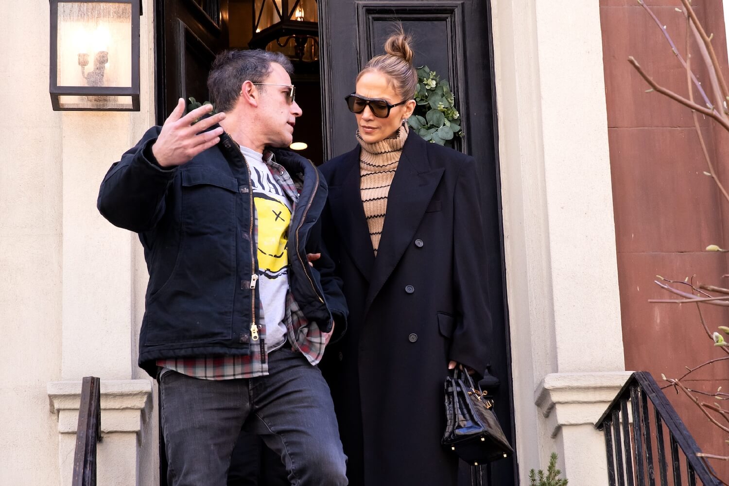 Ben Affleck turning back to speak to Jennifer Lopez while out in New York City in March 2024