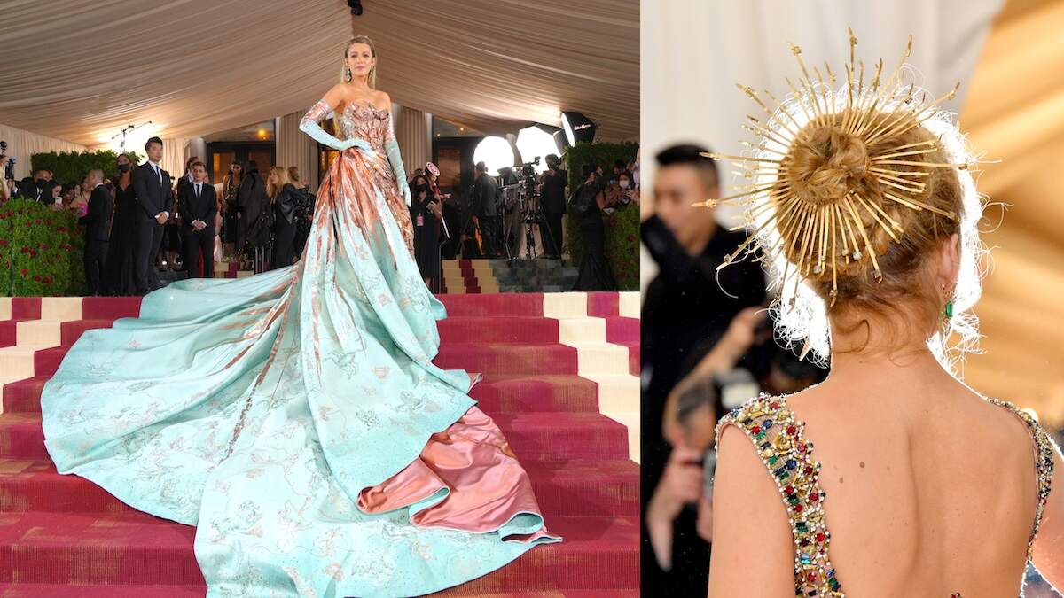 Actor Blake Lively poses at the Met Gala in a blue and pink gown