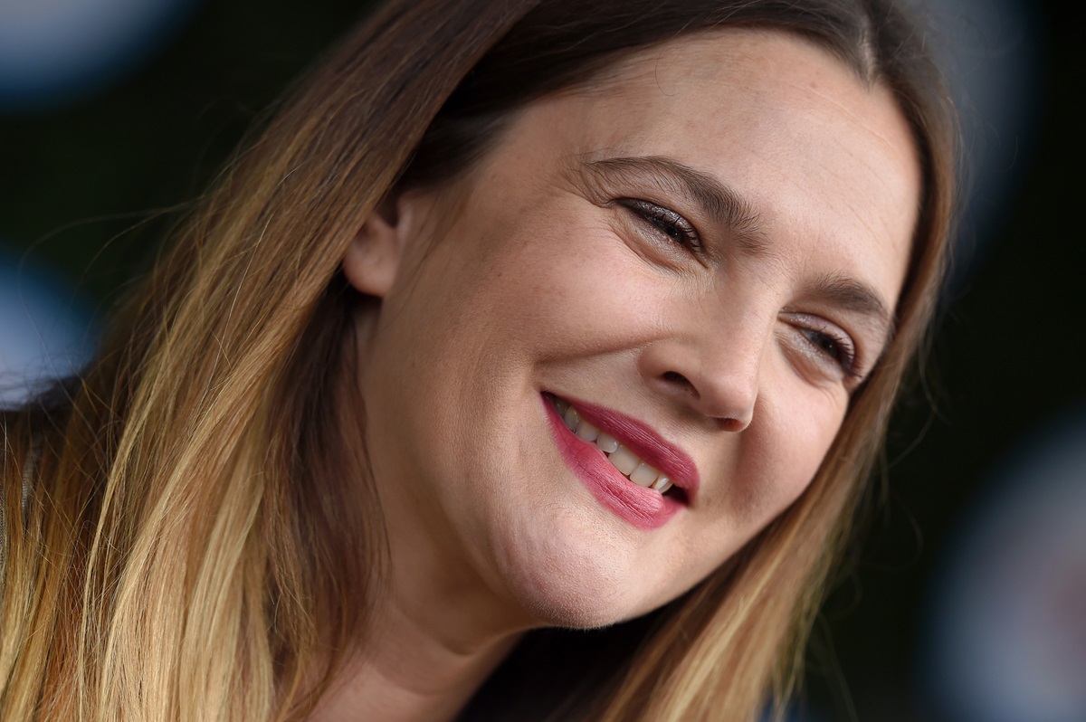 Drew Barrymore posing at Safe Kids Day at Smashbox Studios.