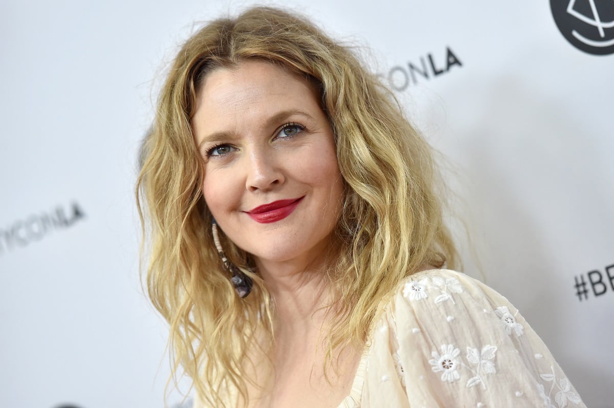 Drew Barrymore posing at the Beautycon Festival LA 2018 at Los Angeles Convention Center.