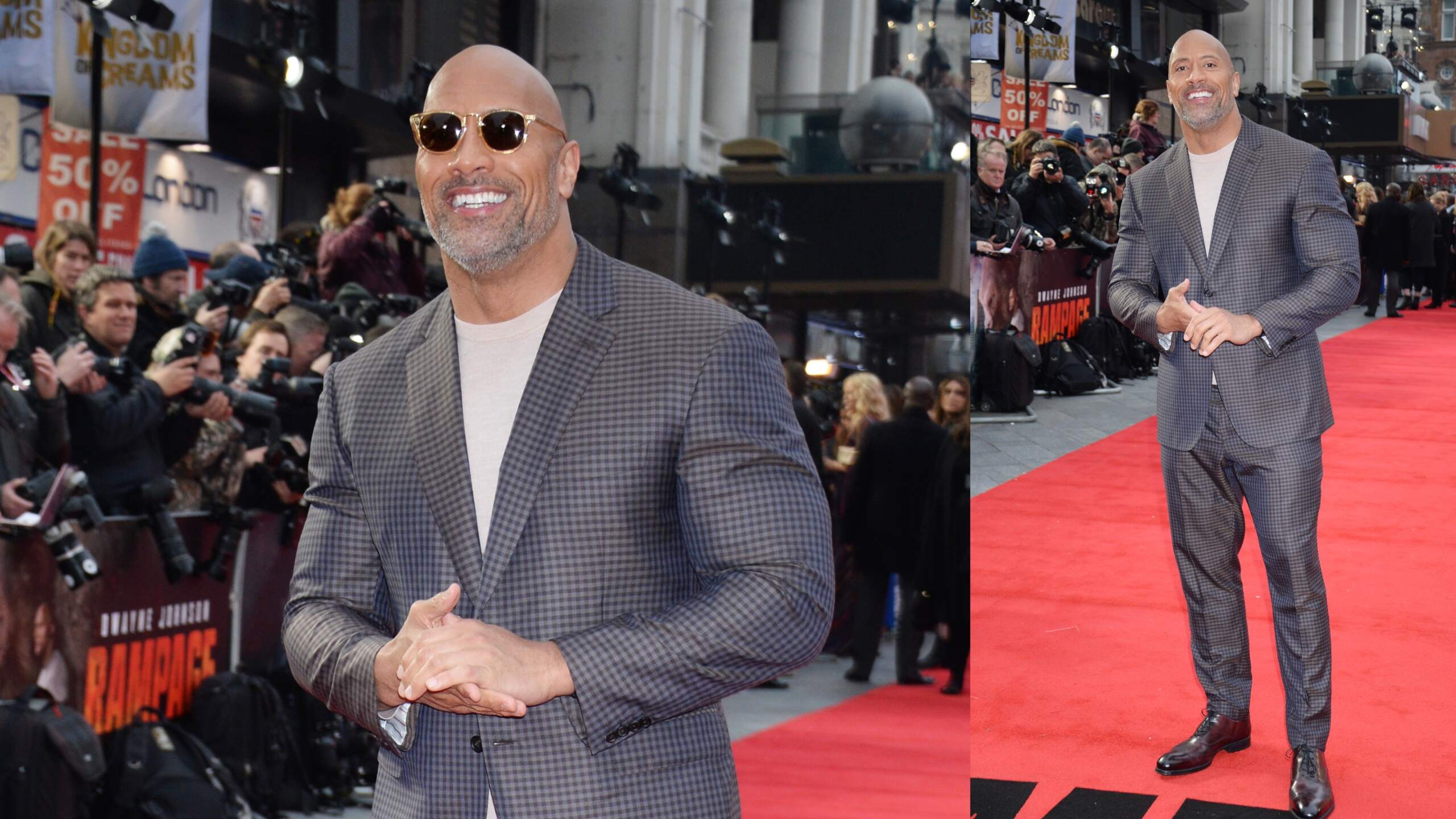Wearing a checkered gray suit, Dwayne Johnson walks the red carpet at the Rampage premiere