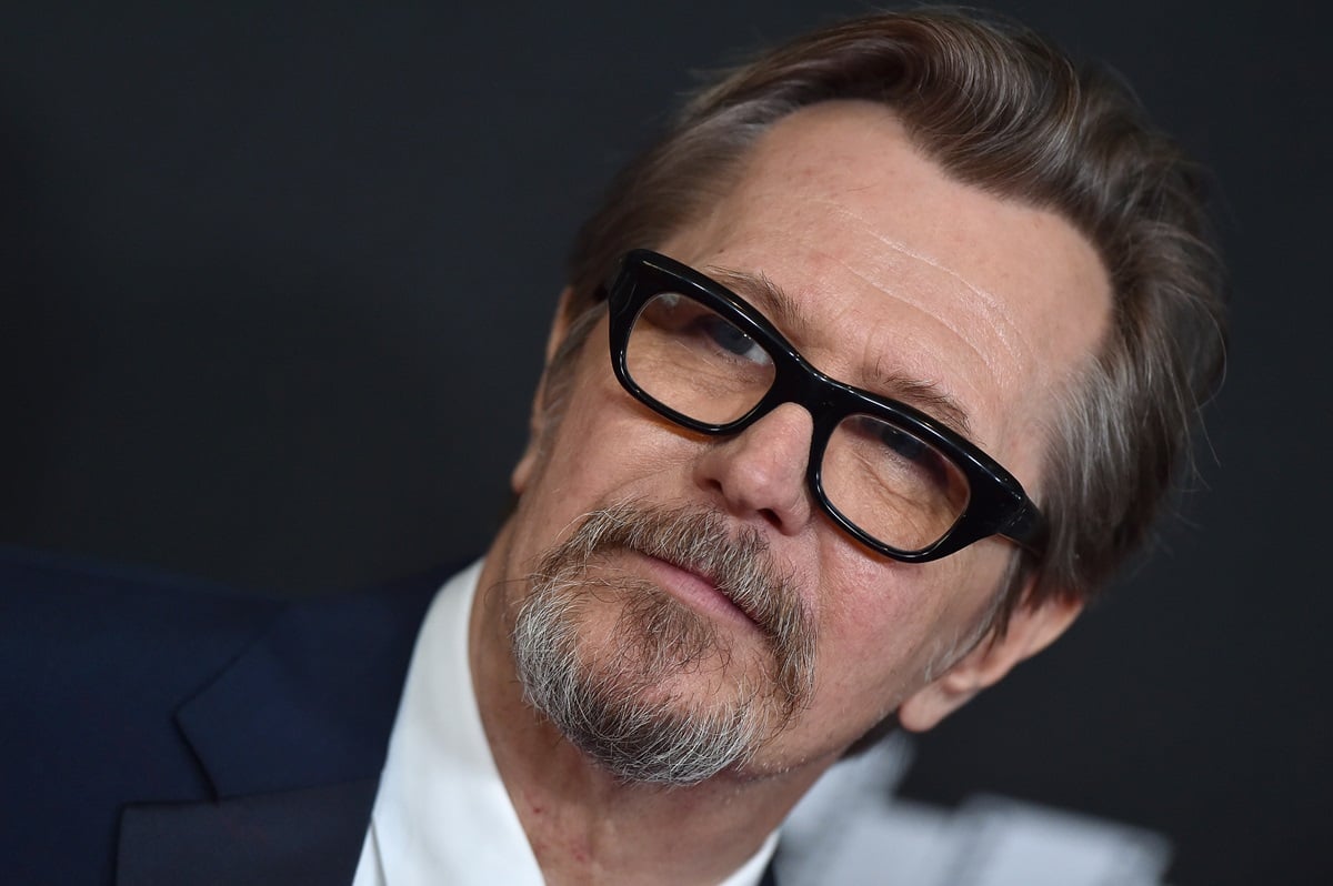 Gary Oldman posing in a suit at the 21st Annual Hollywood Film Awards at The Beverly Hilton Hotel.