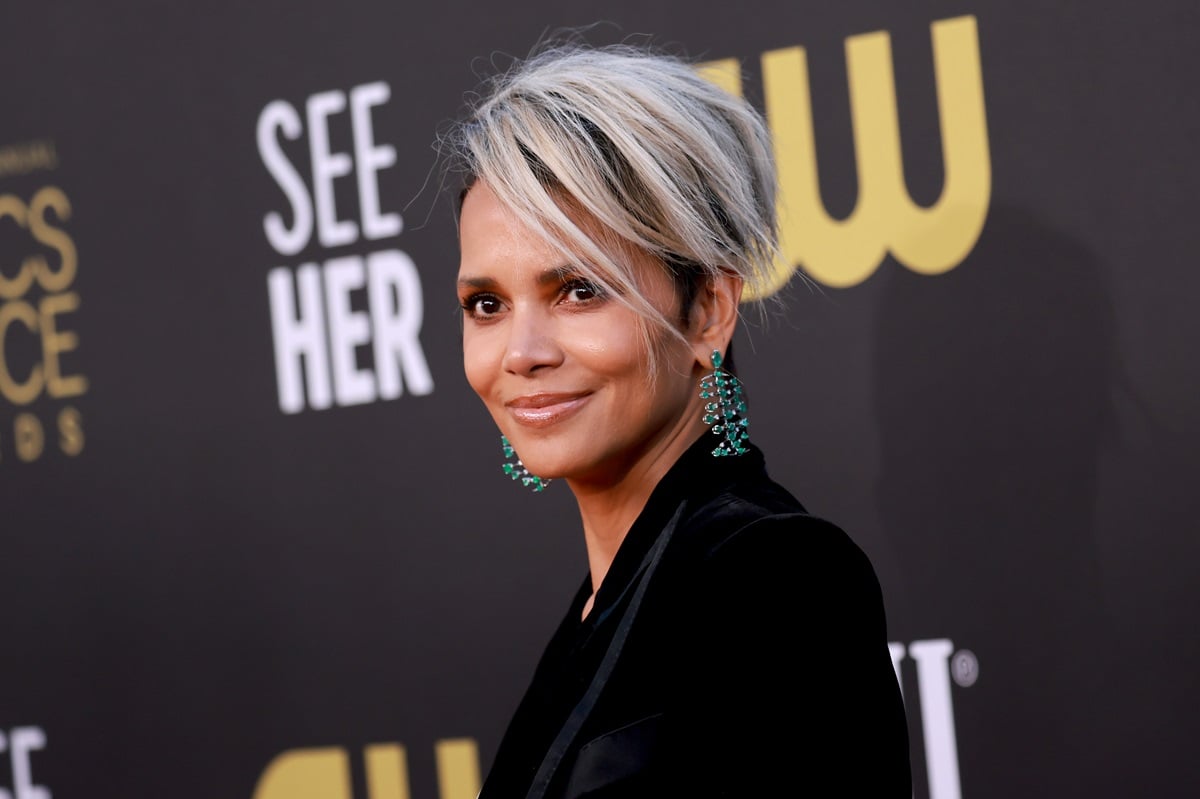 Halle Berry posing in a black jacket at the 27th Annual Critics Choice Awards.