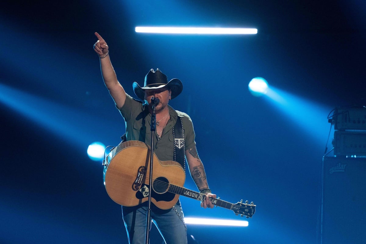 Jason Aldean with a guitar performing at the 2023 ACM Awards