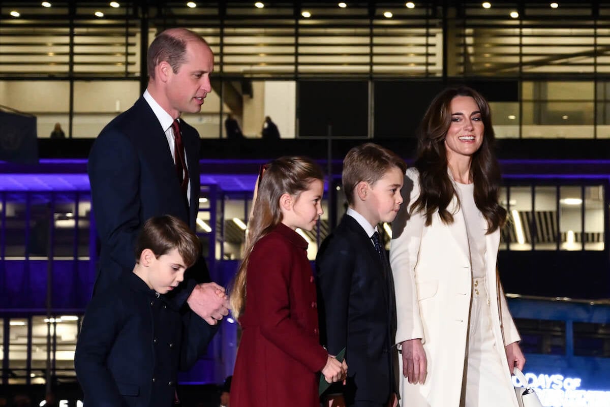 Kate Middleton, who is staying 'resolutely cheerful' around her children amid here cancer diagnosis, with Prince William, Prince George, Princess Charlotte, and Prince Louis outside Westminster Abbey