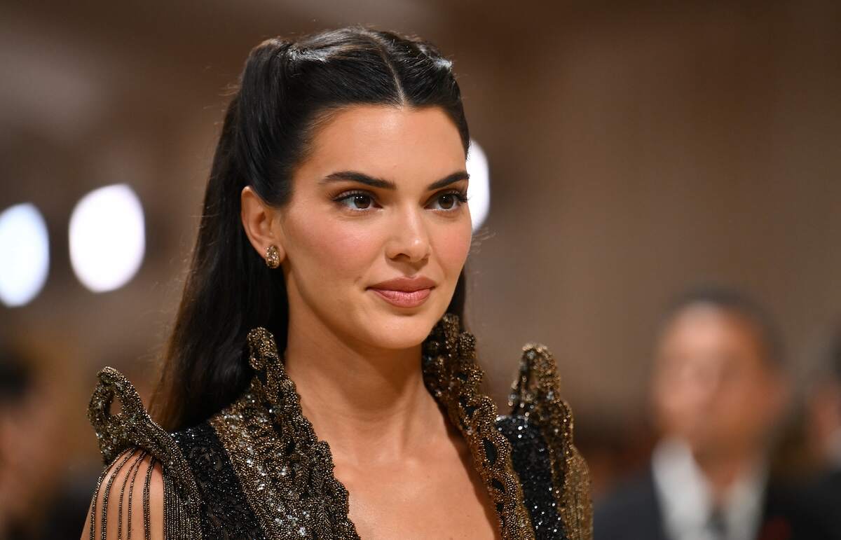 A photo of Kendall Jenner from the chest up while she's posing on the red carpet at the 2024 Met Gala