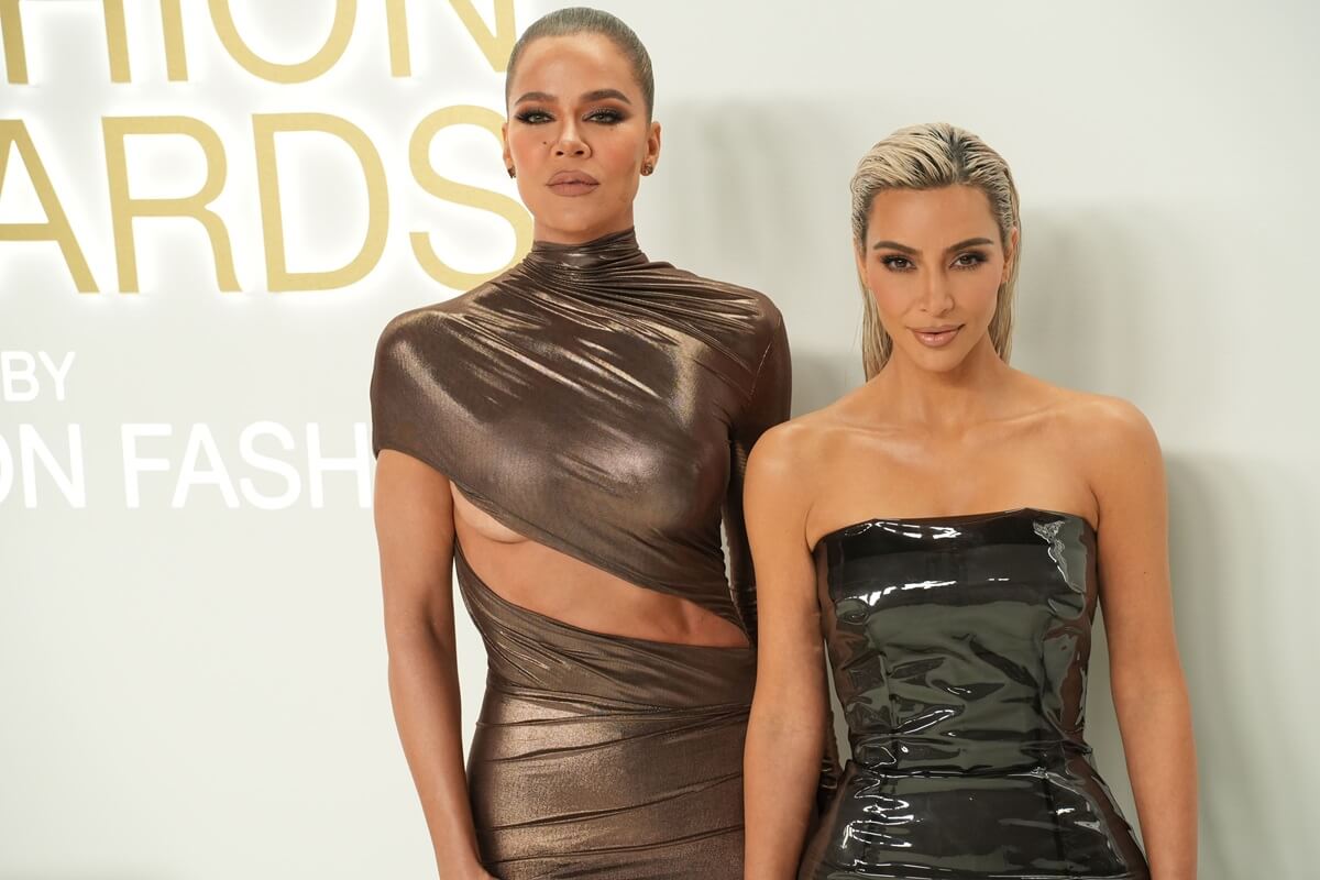 Khloe Kardashian and Kim Kardashian attend 2022 CFDA Fashion Awards.