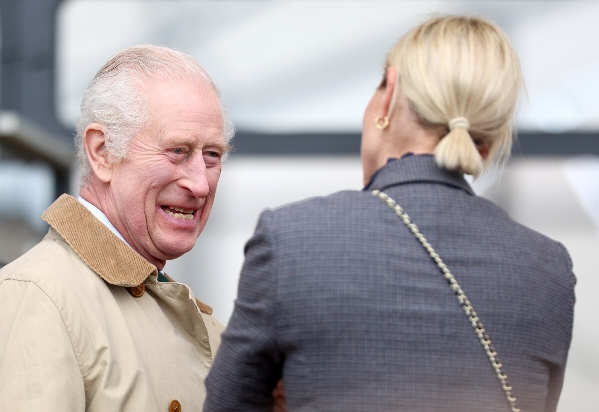 King Charles III and Zara Tindall greet each other at the Endurance event on day 3 of the Royal Windsor Horse Show