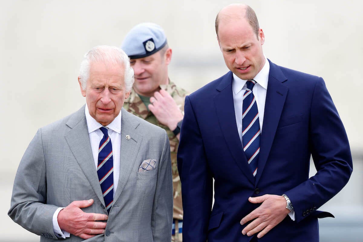 King Charles, who Prince William is reportedly worried about as he returns to public duties, on May 13, 2024, walks with his oldest son