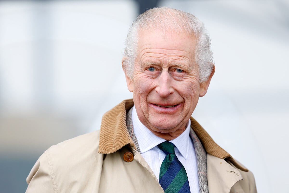 King Charles, who reportedly felt 'uncomfortable' about a happy birthday call to Prince Archie, smiles and looks on