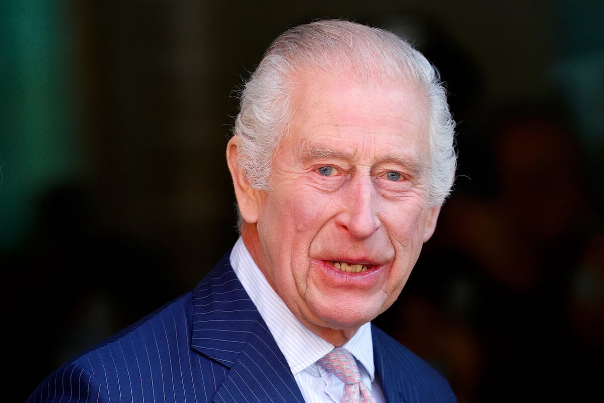 King Charles, who wants to ride horseback at 2024's Trooping the Colour, looks on wearing a suit and tie