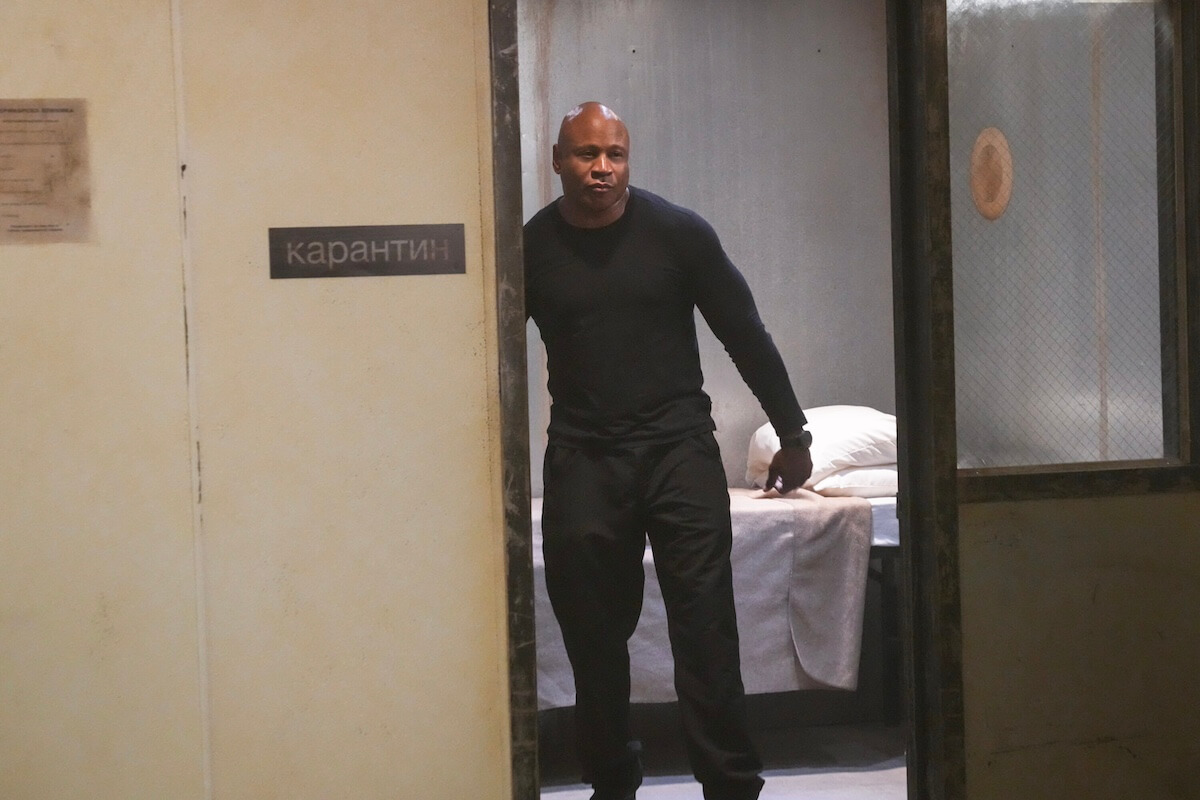 LL Cool J as Sam Hanna standing in a doorway with a bed behind him in the 'NCIS: Hawai'i' series finale