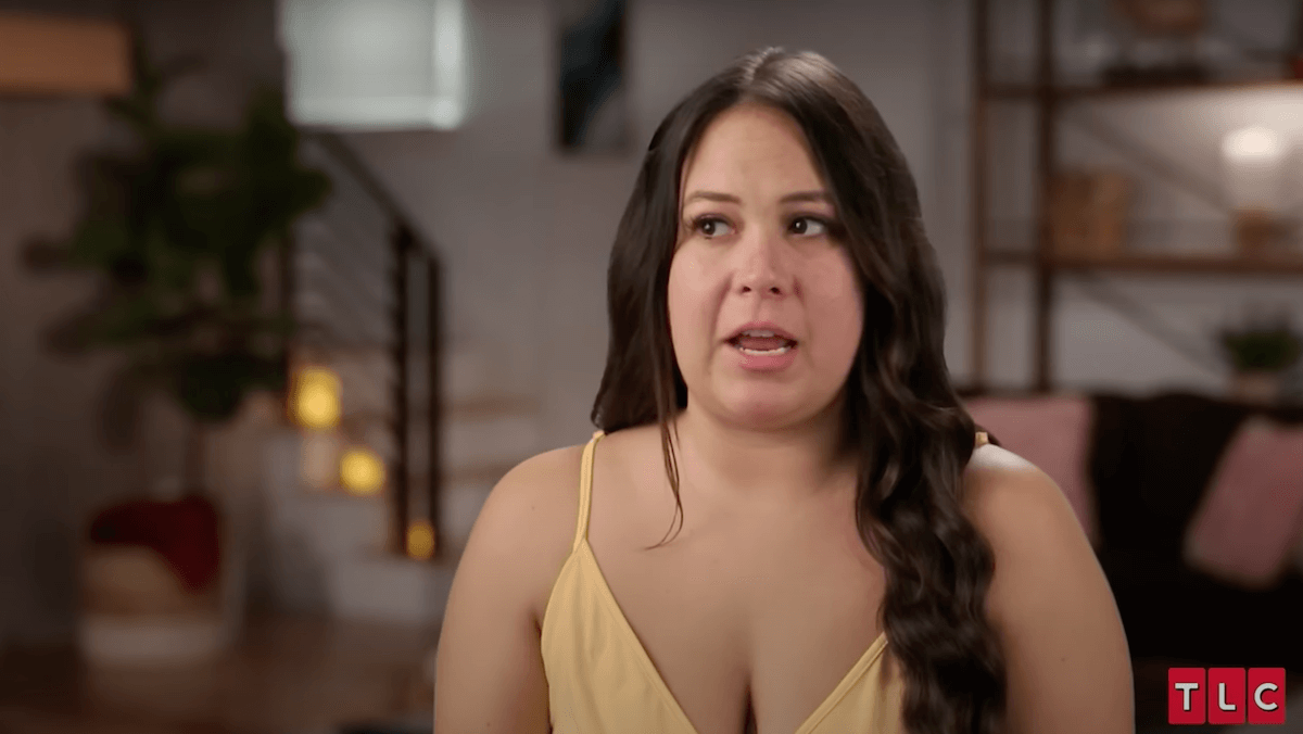 Liz Woods of '90 Day Fiancé' in a yellow spaghetti strap top