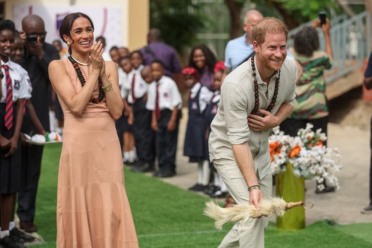 Meghan Markle and Prince Harry take part in activities at the Lightway Academy in Abuja, Nigeria