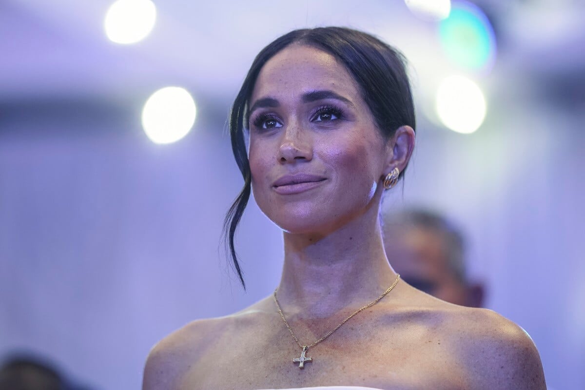 Meghan Markle looks on as she attends a Sit Out at the Nigerian Defence Headquarters in Abuja