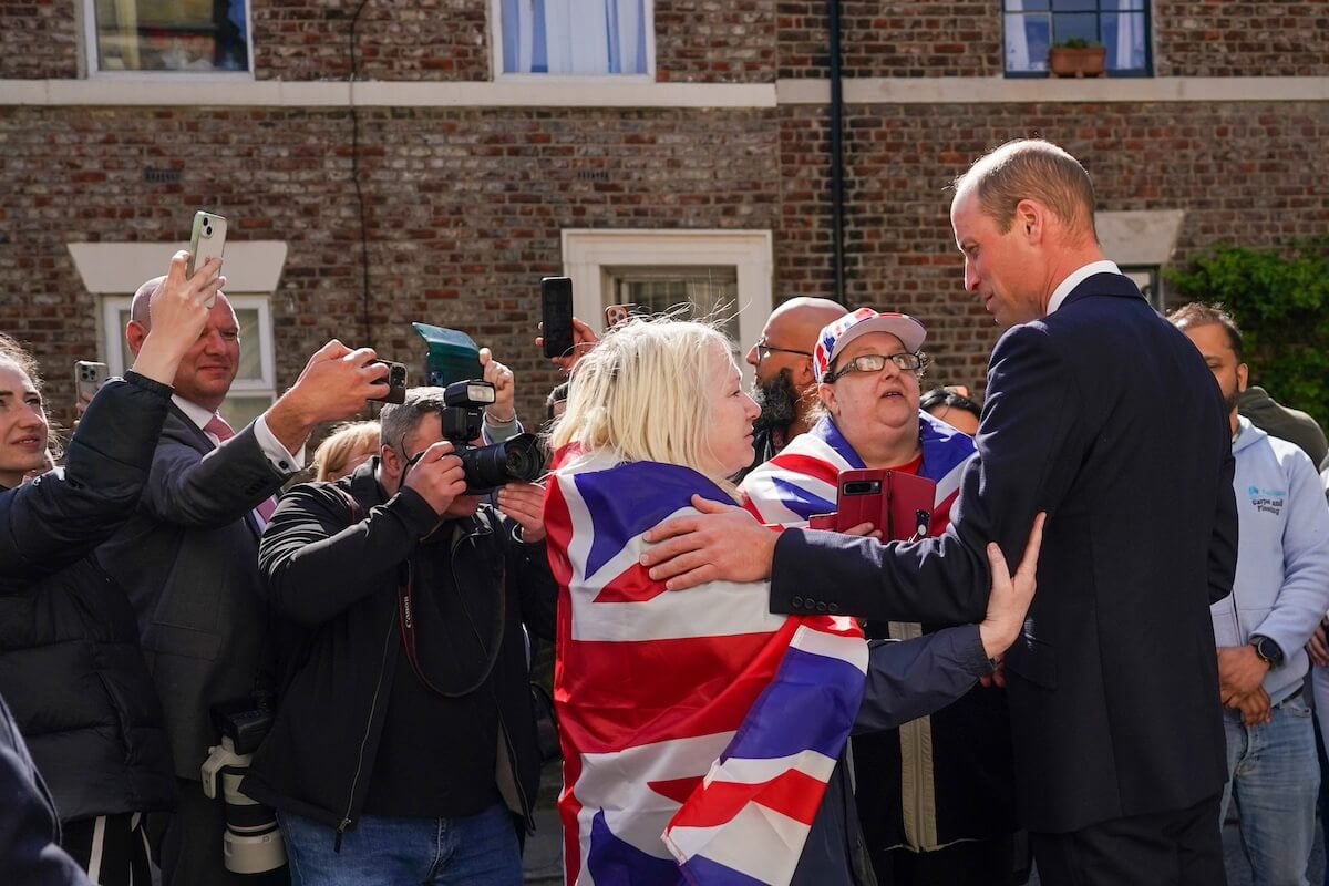 Prince William greets fans during a royal appearance in April 2024