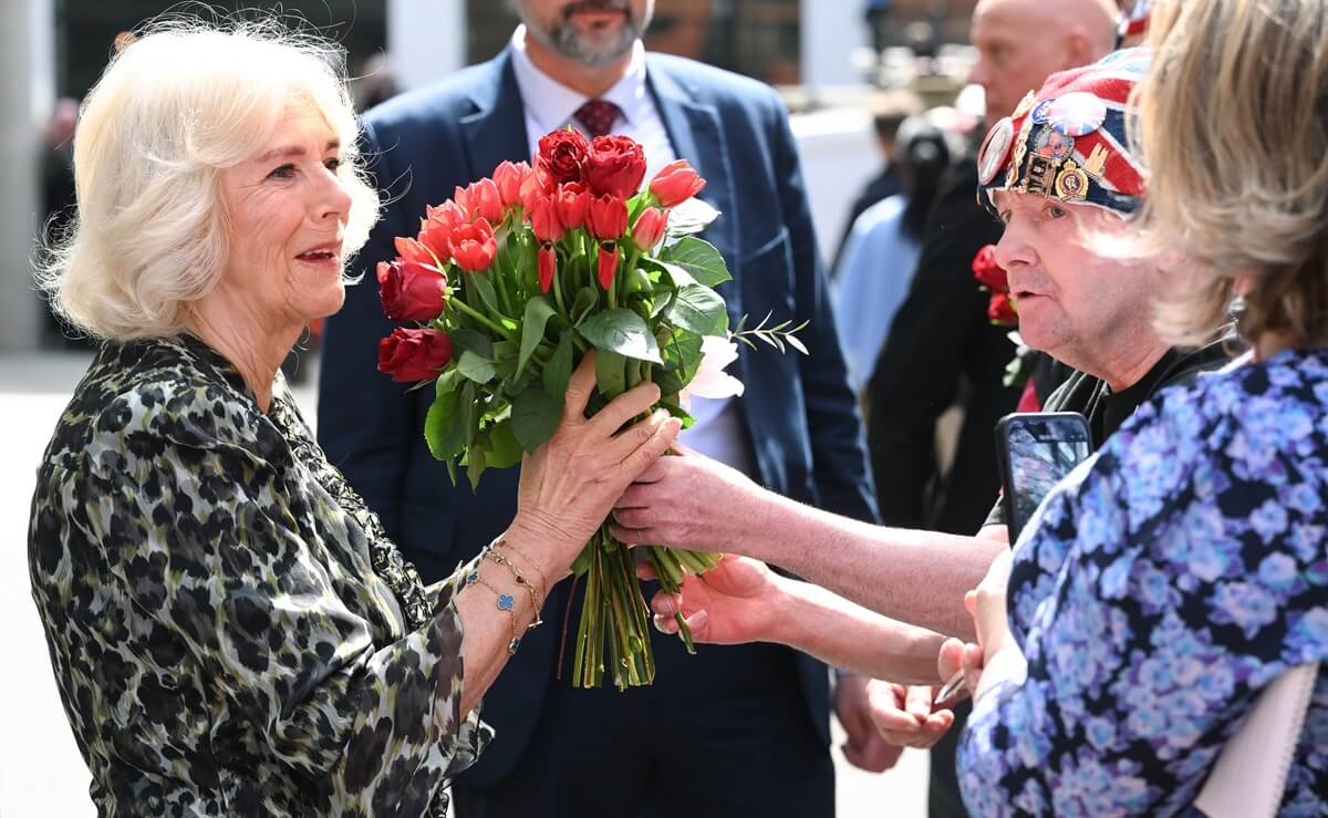 Queen Camilla receives flowers after visiting the University College Hospital Macmillan Cancer Centre 
