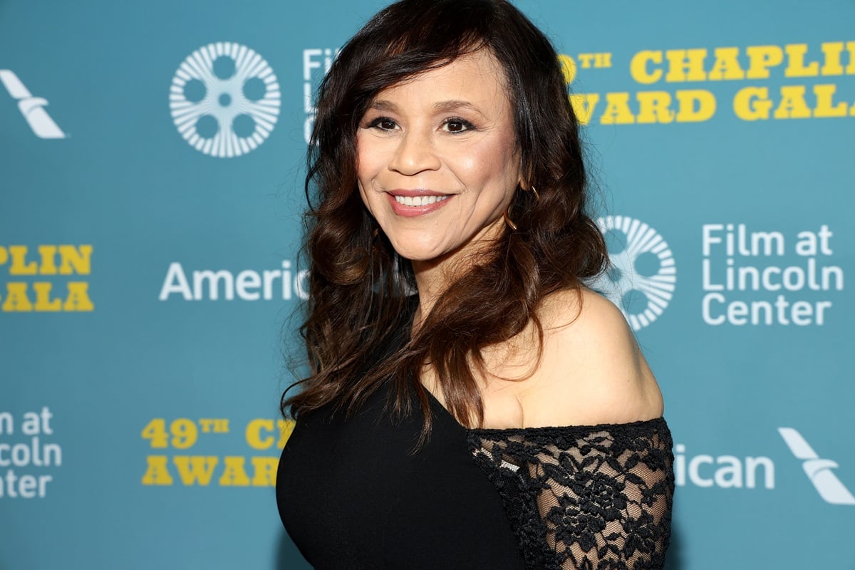 Rosie Perez smiling in a black dress while at the 49th Chaplin Award Honoring Jeff Bridges.
