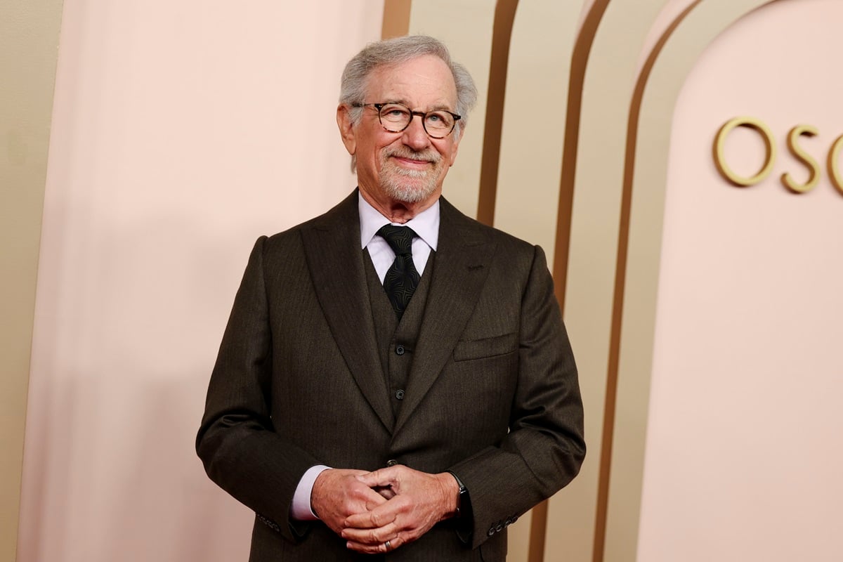 Steven Spielberg arriving at the 2024 Oscars Nominees Luncheon Red Carpet in a suit.