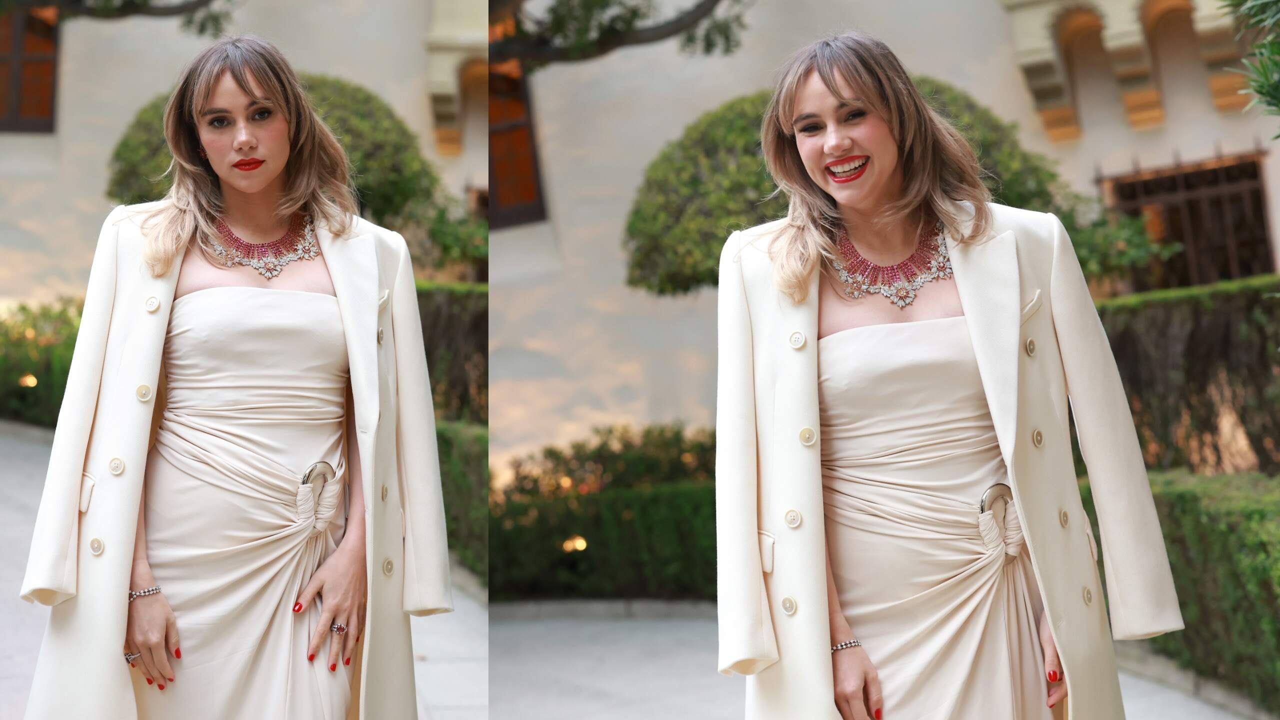 Actor/singer Suki Waterhouse laughs while wearing a white dress and white coat at the Tiffany & Co. Celebration of the launch of Blue Book 2024