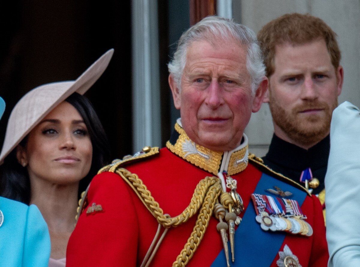 Then-Prince Charles with Prince Harry and Meghan Markle on the balcony during Trooping The Colour 2018