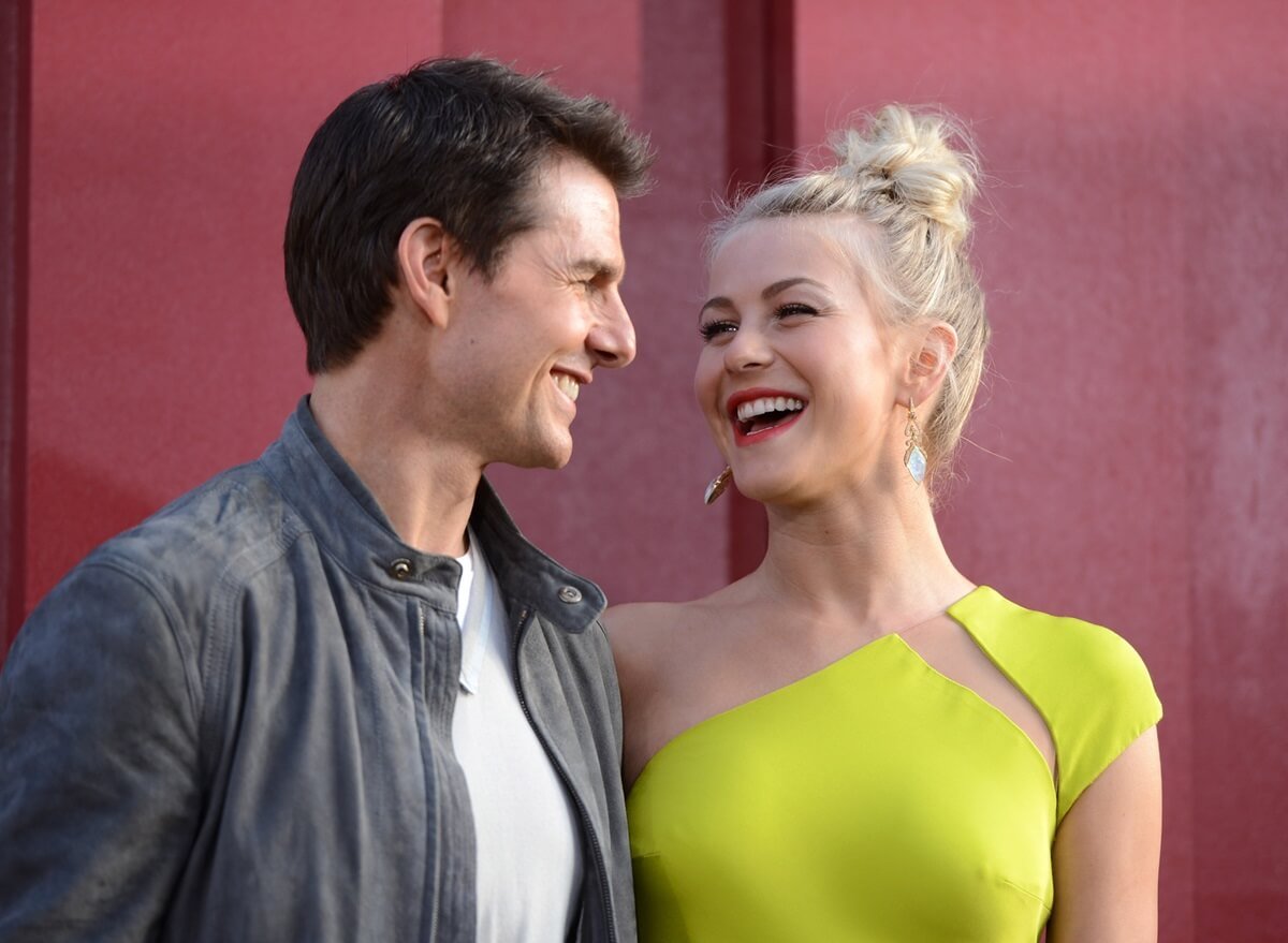 Tom Cruise posing alongside Julianne Hough at the premiere of 'Rock of Ages'.