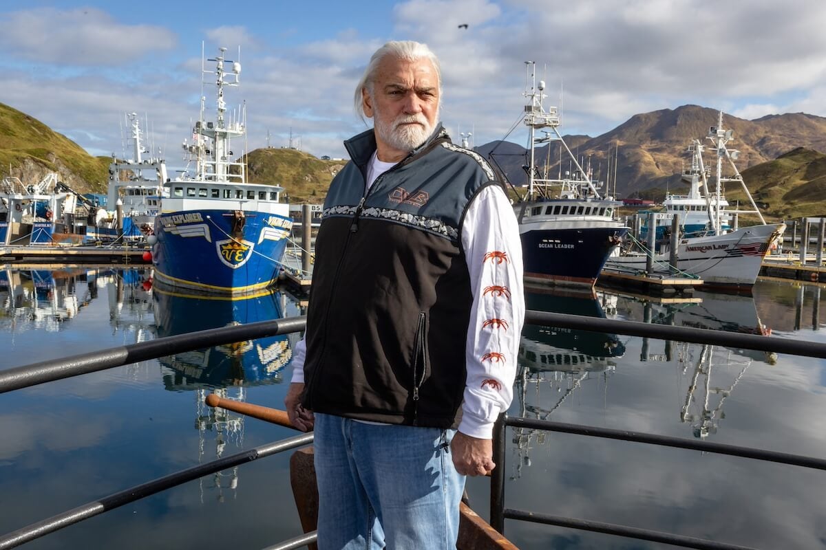 Wild Bill Wichrowski standing in front of boats in 'Deadliest Catch' Season 20