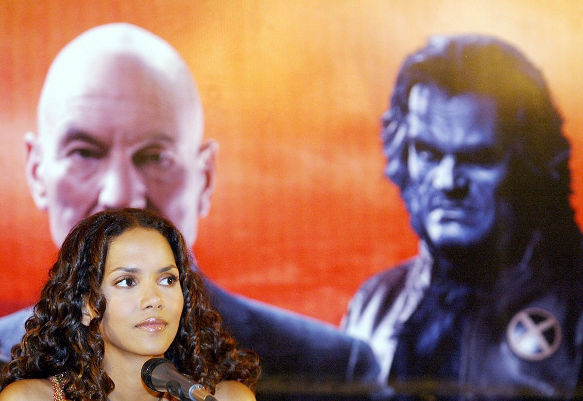 Halle Berry sitting down speaking at an 'X-Men The Last Stand' press conference.