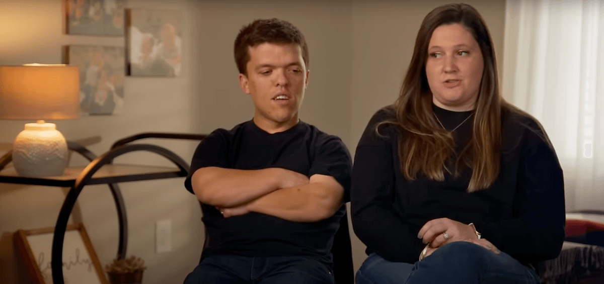 Zach Roloff, with his arms crossed, sitting next to Tori Roloff in 'Little People, Big World'