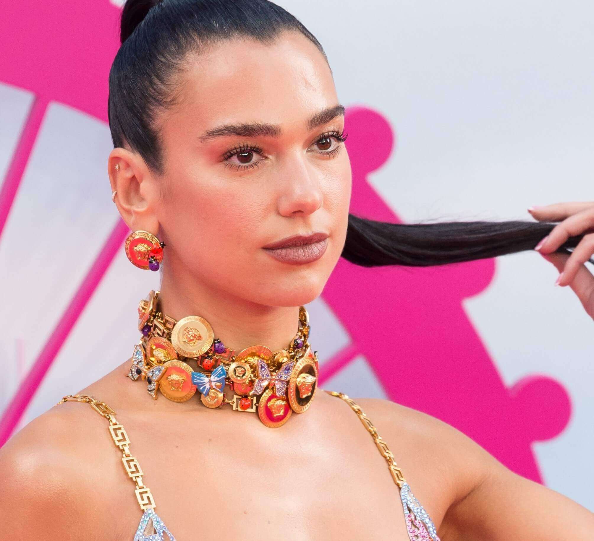 "Dance the Night" singer Dua Lipa promoting 'Barbie' while wearing a ponytail